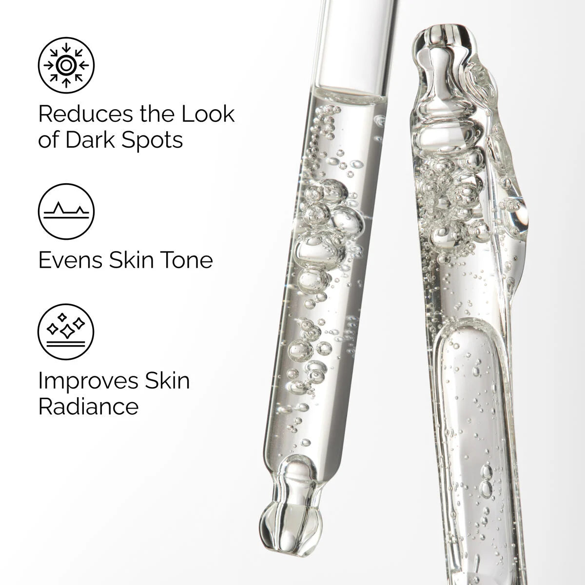 The Ordinary Alpha Arbutin Serum clear droplets on glass surface