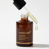 Medicube AGE-R Glutathione Serum clear droplets on glass surface