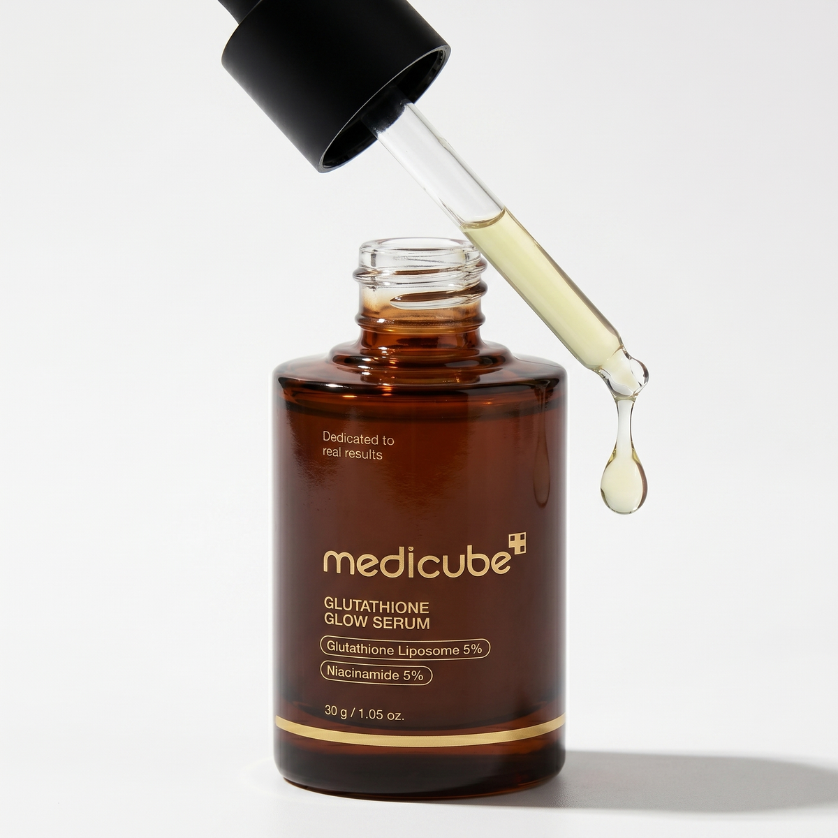 Medicube AGE-R Glutathione Serum clear droplets on glass surface