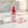 Medicube TXA Niacinamide 15 Serum on white marble vanity