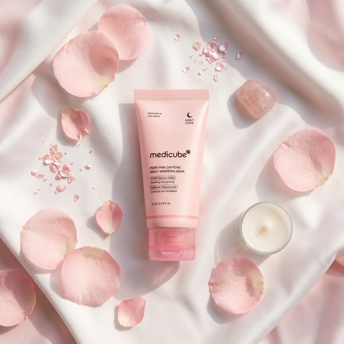 Medicube PDRN Pink Night Mask with rose petals and pink shimmer