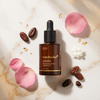 Medicube Glutathione Glow Serum with cocoa beans and pink flowers