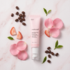 Medicube PDRN Eye Cream with pink petals and coffee beans