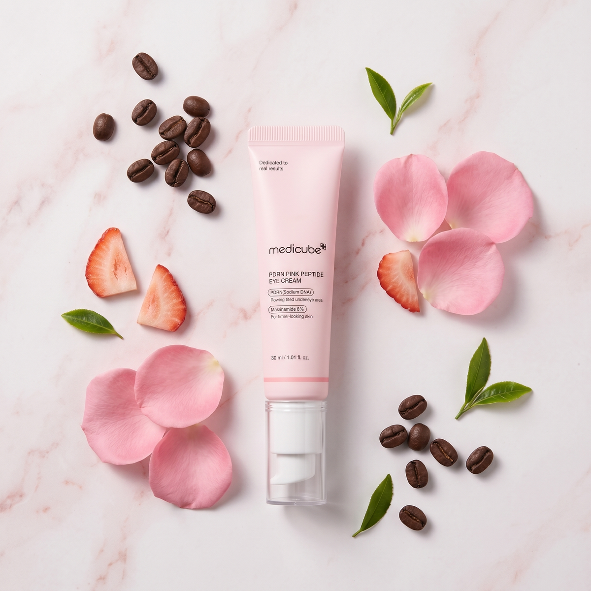 Medicube PDRN Eye Cream with pink petals and coffee beans