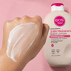 eos Strawberry Cashmere Body Lotion creamy texture swatched on skin