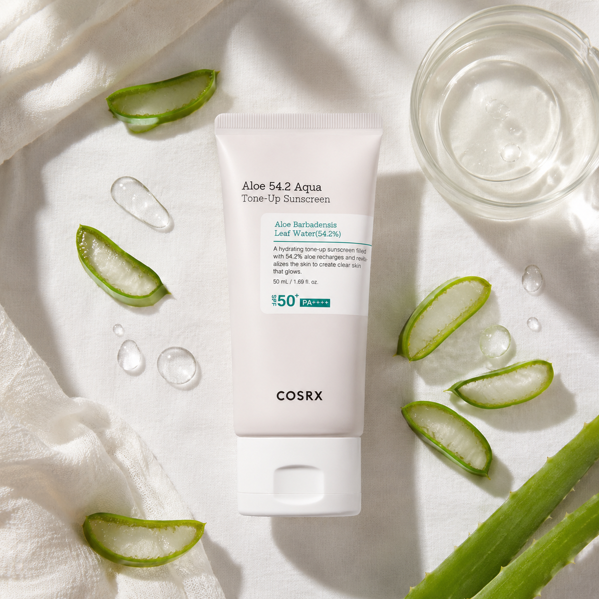 COSRX Aloe Tone-Up Sunscreen with fresh aloe leaves and clear gel