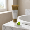 Skin1004 Madagascar Centella Ampoule Foam next to bathroom sink