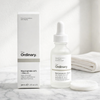 The Ordinary Niacinamide 10% + Zinc 1% Serum on white marble vanity