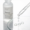 The Ordinary Niacinamide Zinc Serum clear droplets on glass surface