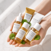 Skin1004 Madagascar Centella Travel Kit with centella leaves on marble