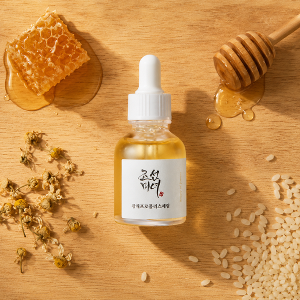 Beauty of Joseon Glow Serum with honeycomb and propolis on wooden surface
