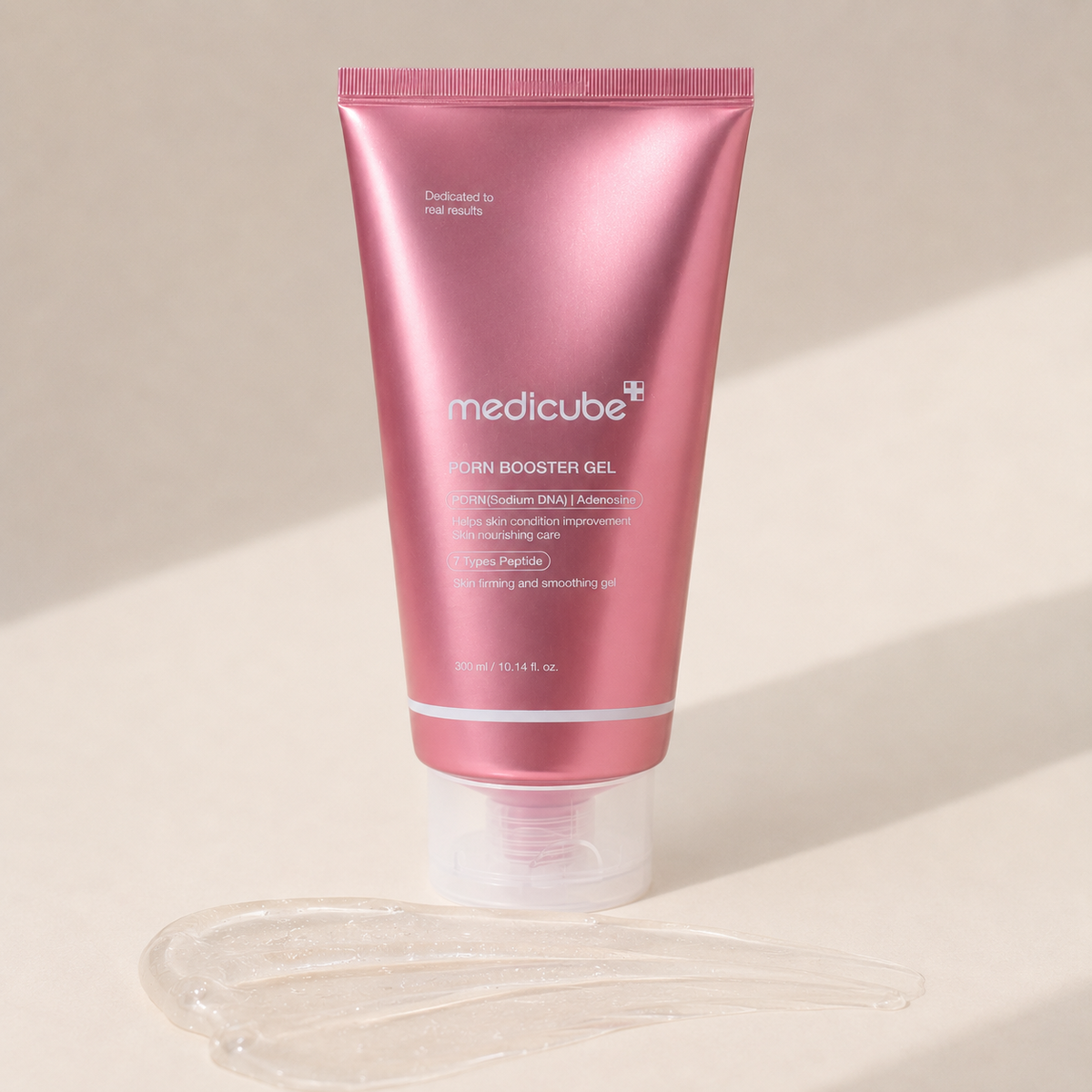 Medicube PDRN Booster Gel smooth clear gel texture swatched on skin