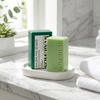Some By Mi AHA BHA PHA Miracle Cleansing Bar on marble bathroom shelf