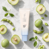 Beauty of Joseon Aqua Fresh Sunscreen with green plum and soybean on surface