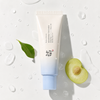 Beauty of Joseon Aqua Fresh Sunscreen on marble surface with water droplets