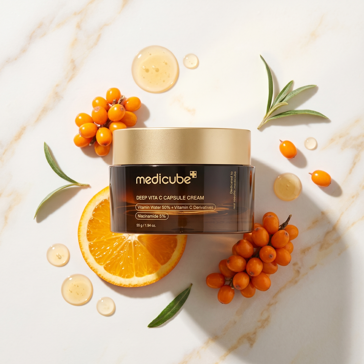 Medicube Vita C Cream with sea buckthorn berries and orange slices